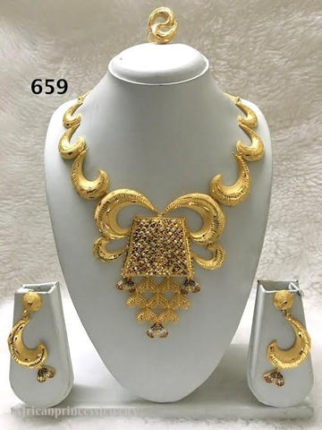 THREE PIECE INDIAN/ AFRICAN GOLD PLATED NECKLACE SET.