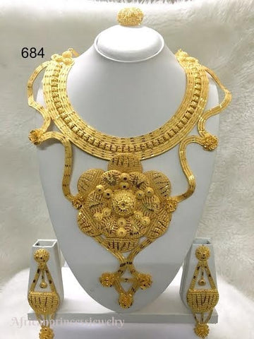 THREE PIECE INDIAN / AFRICAN GOLD PLATED NECKLACE SET.