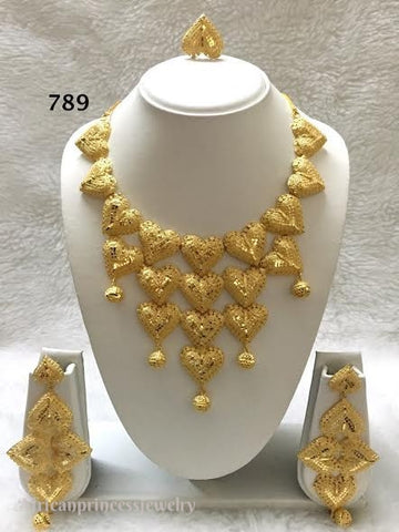 THREE PIECE INDIAN / AFRICAN GOLD PLATED NECKLACE SET
