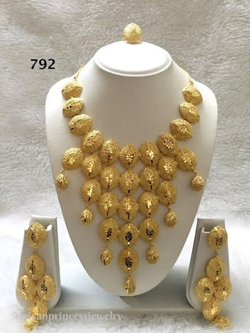 THREE PIECE INDIAN / AFRICAN GOLD PLATED NECKLACE SET