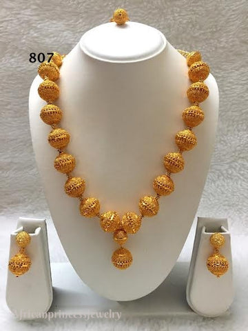 THREE PIECE INDIAN / AFRICAN GOLD PLATED NECKLACE SET