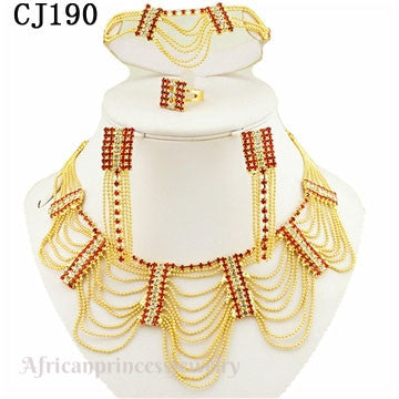 FOUR PIECE 18K GOLD PLATED NECKLACE SET