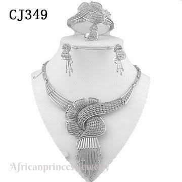 FOUR PIECE 18K WHITE GOLD PLATED SILVER NECKLACE SET