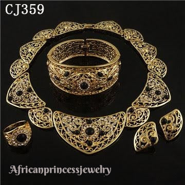 FOUR PIECE 18K GOLD PLATED NECKLACE SET