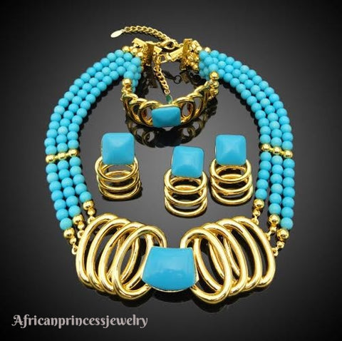 FOUR PIECE 18K GOLD PLATED NECKLACE SET