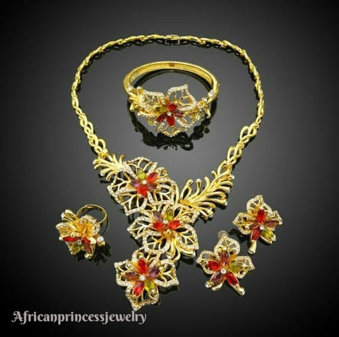 FOUR PIECE 18K GOLD PLATED NECKLACE SET
