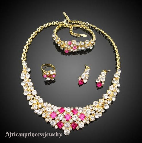 FOUR PIECE 18K GOLD PLATED NECKLACE SET