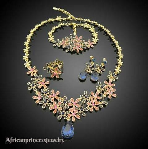 FOUR PIECE 18K GOLD PLATED NECKLACE SET
