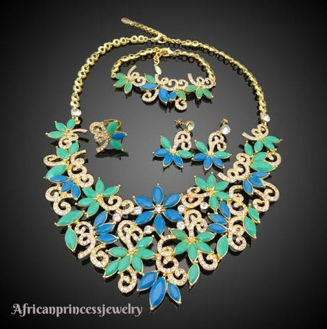 FOUR PIECE 18K GOLD PLATED NECKLACE SET