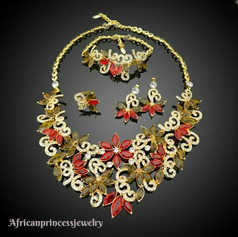 FOUR PIECE 18K GOLD PLATED NECKLACE SET