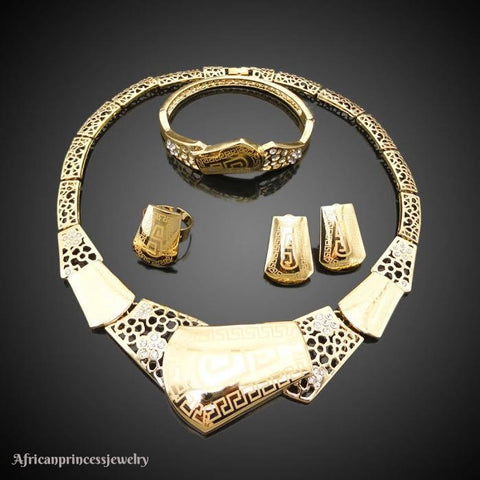 FOUR PIECE 18K GOLD PLATED NECKLACE SET