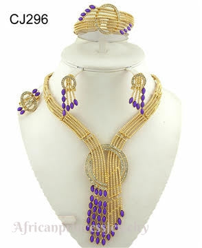 FOUR PIECE 18K GOLD PLATED NECKLACE SET