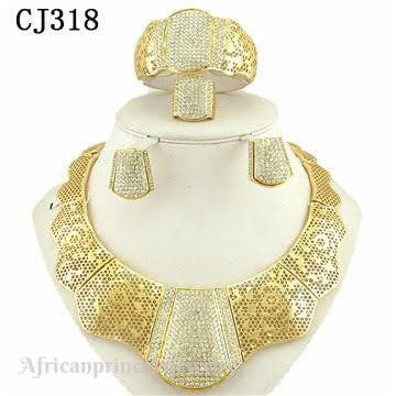 FOUR PIECE AFRICAN GOLD PLATED NECKLACE SET