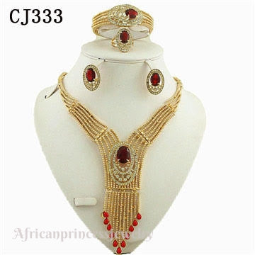 FOUR PIECE 18K GOLD PLATED NECKLACE SET