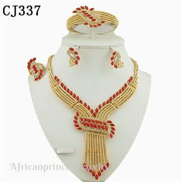 FOUR PIECE 18K GOLD PLATED NECKLACE SET