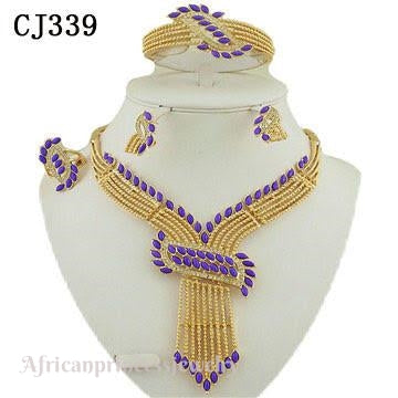 FOUR PIECE 18K GOLD PLATED NECKLACE SET