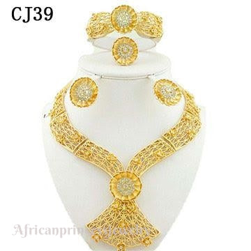 FOUR PIECE 18K GOLD PLATED NECKLACE SET