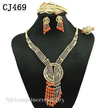 FOUR PIECE 18K GOLD PLATED NECKLACE SET