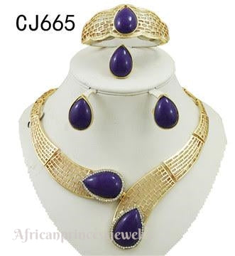 FOUR PIECE 18K GOLD PLATED NECKLACE SET