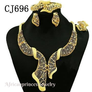 FOUR PIECE 18K GOLD PLATED NECKLACE SET