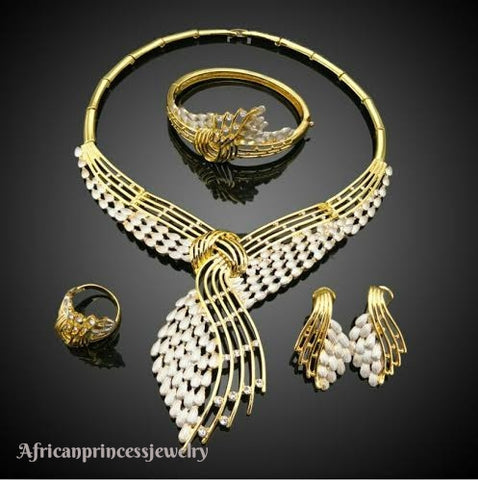 FOUR PIECE 18K GOLD PLATED NECKLACE SET
