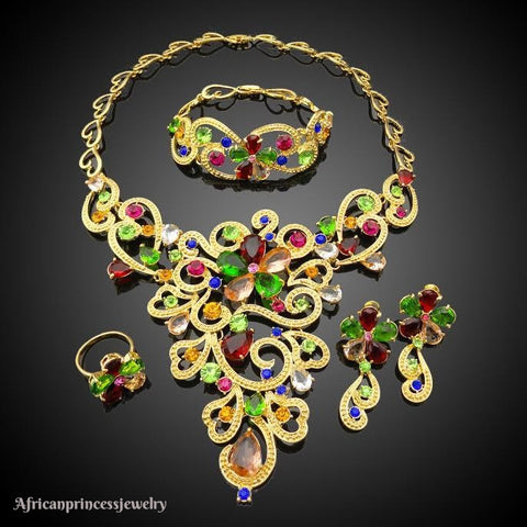 FOUR PIECE 18K GOLD PLATED NECKLACE SET