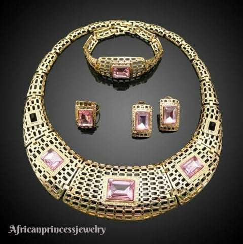 FOUR PIECE 18K GOLD PLATED NECKLACE SET