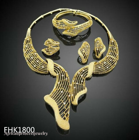 FOUR PIECE GOLD PLATED NECKLACE SET