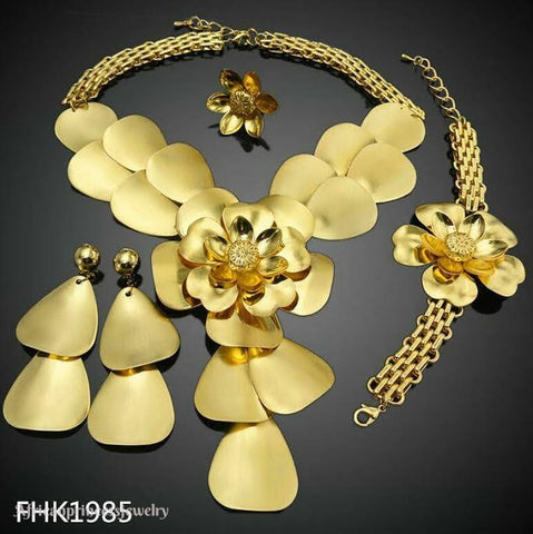 FOUR PIECE 18K GOLD PLATED NECKLACE SET