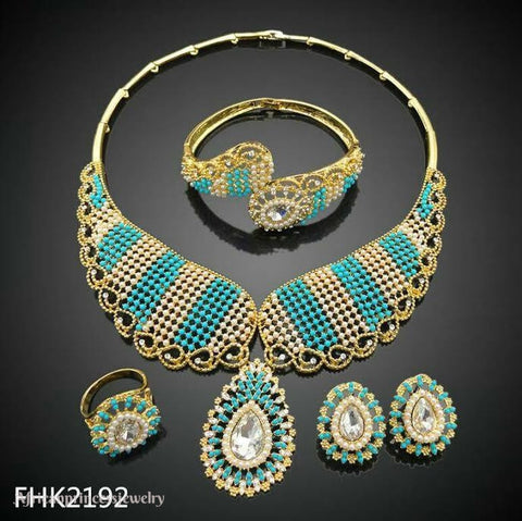 FOUR PIECE 18K GOLD PLATED NECKLACE SET