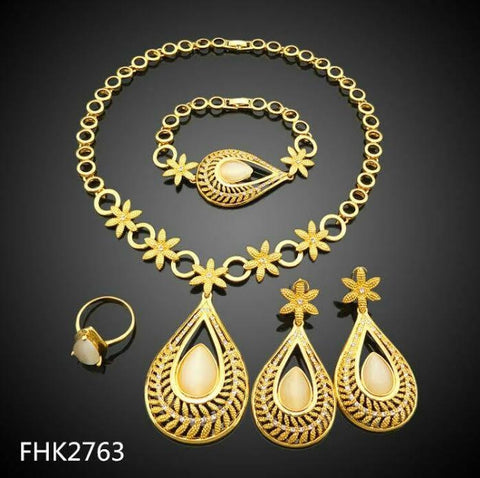 FOUR PIECE 18K GOLD PLATED NECKLACE SET