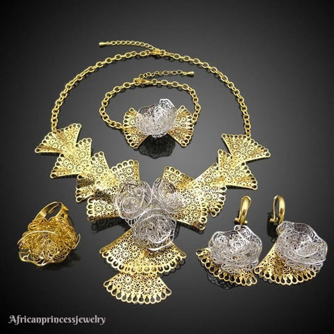 FOUR PIECE 18K GOLD PLATED NECKLACE SET
