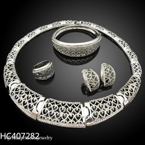 FOUR PIECE 18K GOLD PLATED NECKLACE SET