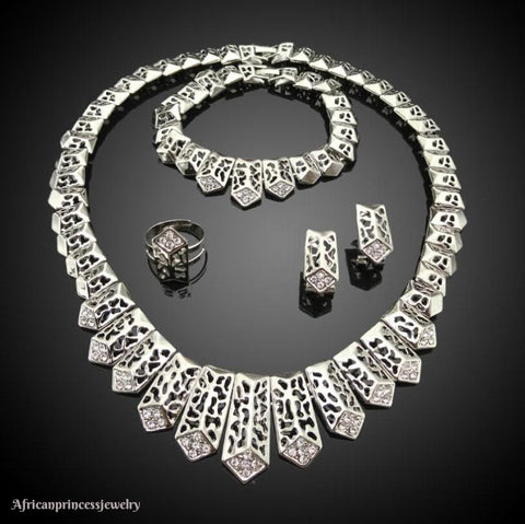 FOUR PIECE 18K WHITE GOLD PLATED NECKLACE SET