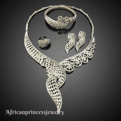 FOUR PIECE 18K WHITE GOLD PLATED SILVER NECKLACE SET