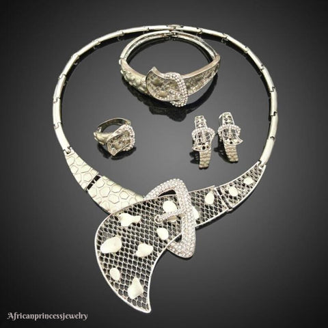 FOUR PIECE 18K WHITE GOLD PLATED NECKLACE SET