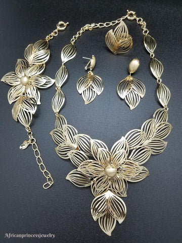 FOUR PIECE 18K GOLD PLATED NECKLACE SET