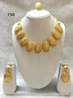 THREE PIECE INDIAN / AFRICAN GOLD PLATED NECKLACE SET.