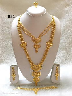 THREE PIECE INDIAN / AFRICAN GOL PLATED NECKLACE SET