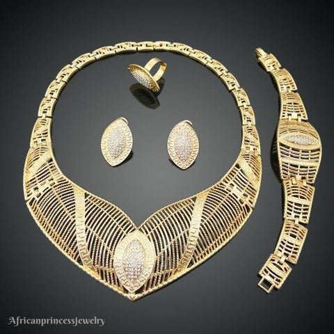 FOUR PIECE AFRICAN GOLD PLATED NECKLACE SET