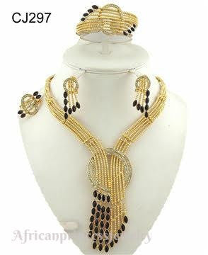 FOUR PIECE AFRICAN GOLD PLATED NECKLACE SET