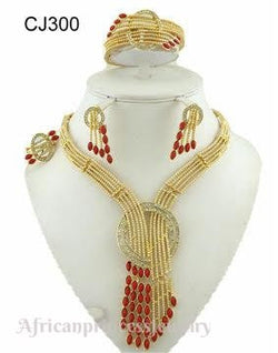 FOUR PIECE AFRICAN GOLD PLATED NECKLACE SET