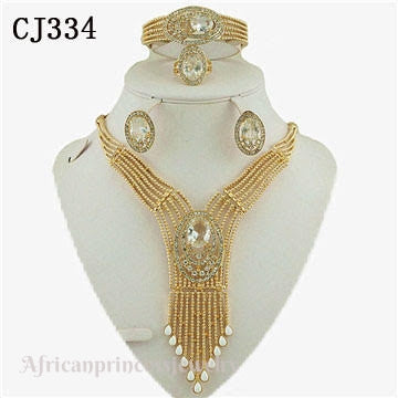 FOUR PIECE 18K GOLD PLATED NECKLACE SET