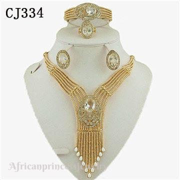 FOUR PIECE AFRICAN GOLD PLATED NECKLACE SET