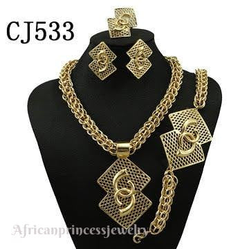 FOUR PIECE AFRICAN GOLD PLATED NECKLACE SET