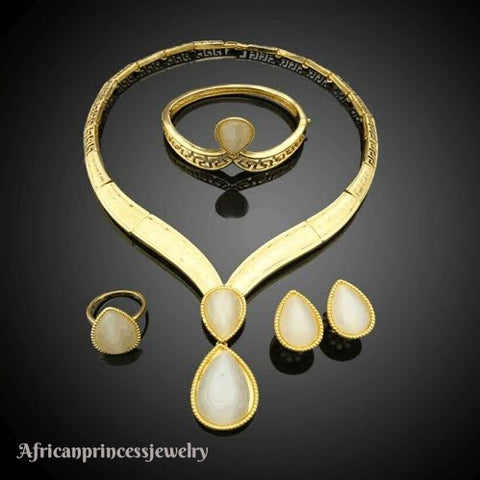 FOUR PIECE 18K GOLD PLATED NECKLACE SET