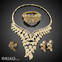 FOUR PIECE AFRICAN GOLD PLATED NECKLACE SET