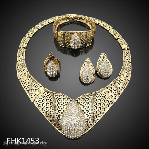 FOUR PIECE 18K  GOLD PLATED AFRICAN NECKLACE SET