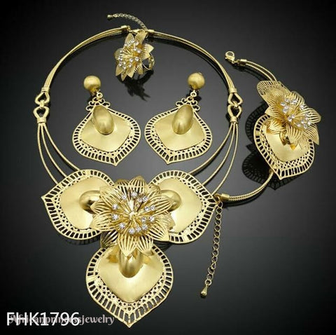 FOUR PIECE AFRICAN GOLD PLATED NECKLACE SET