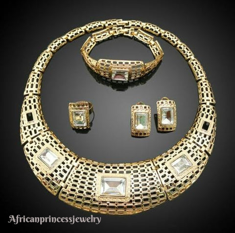 FOUR PIECE 18K GOLD PLATED NECKLACE SET